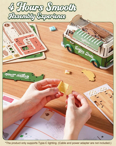 Hands assembling Retro Coffee Truck 3D Wood Puzzle Kit For Adults DIY Model Craft Building Set with instruction manual on desk.