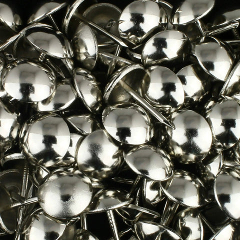 Top Shelf Silver Upholstery Tacks With Hella Durable Build 7 16 Inch Rounded Heads Heavy Duty Nickel Plated Steel Push Pins 100 Pack close-up.