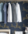 Closet with clothes against wall covered in Blue Denim Zebra Safari Peel And Stick Wallpaper Self Adhesive Wall Covering.