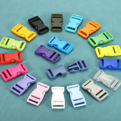 Colorful array of 4 Pack Quick Side Release Buckles 1 Inch Plastic Clips Dual Adjustable Belt Snap Fasteners For Backpacks Outdoor Gear Paracord Bracelets Pet Collars White, including white and other colors, displayed on a blue background.