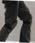 Built Tough Four Pack Black Heavy Duty Knee Pad Inserts For Work Pants Anti Slip Grip visible on gray jeans.