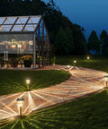 Night garden view with Six Pack Solar Pathway Lights Outdoor Dimmable 10 to 40 Lumens Waterproof IP65 Garden Landscape Lighting