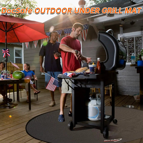 People grilling on black 48 Inch Round Fire Pit Mat With Four Layer Fireproof Heat Insulated Under Grill Pad for decks