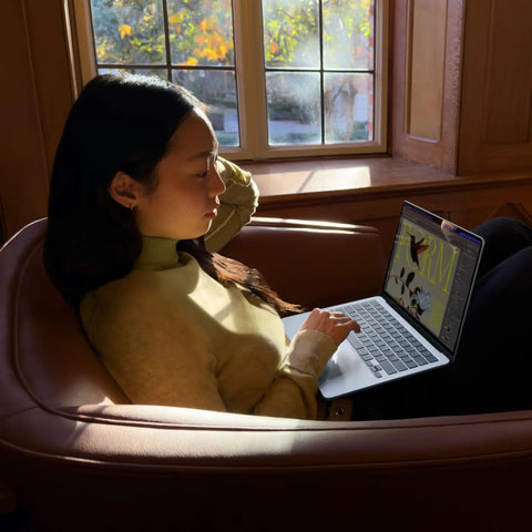 Person using Beast Speed M5 Powered MacBook Air 13.6 Inch Laptop Built For AI, ultra portable, Sky Blue Finish