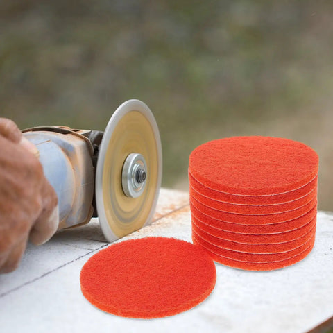 Premium 10 Pack Orange Nylon Wood Sanding Discs With Hook And Loop Design For Rapid Grinding and Flaw Repair On Tools, stacked next to a polishing tool.