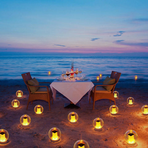 Solar Powered Floating Globes For Pool Pond Patio And Hot Tub Outdoor Lanterns That Look Like Candles Or Torches on beach