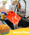 12 Piece Chip and Dip Serving Platter Set BPA Free Plastic Snack Trays with Built In Sauce Compartments being rinsed in sink.