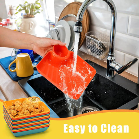12 Piece Chip and Dip Serving Platter Set BPA Free Plastic Snack Trays with Built In Sauce Compartments being rinsed in sink.