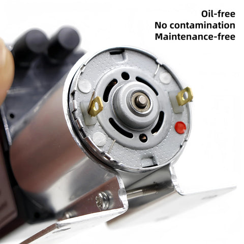 DC 12V vacuum pump front view with metal housing, mounting tabs, and two electrical terminals.