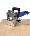 Pro Shop Grade Dual Spindle Dowel Jointer Woodworking Tool with drill heads on wood surface for joinery projects.