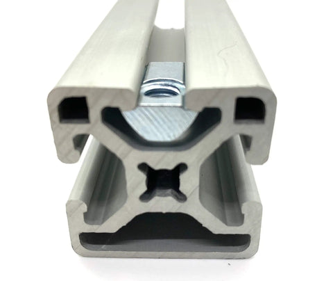 Roll-In T-Nut With Ball Spring 5/16-18 installed in a 15 Series aluminum extrusion, showcasing sturdy 13040 profile fit