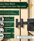 Black Wrought Iron Gate Ring Turn Latch Lock Set 6.5 Inch Wide Reversible Barn Door Catch on wooden gate background.
