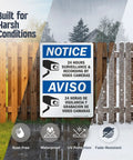 Skip The Drama Outside With Our 24 Hour Video Surveillance Sign 10X14 Inch Durable Aluminum Outdoor Security Plaque shown mounted on a fence.