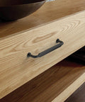 10 Pack 5 Inch Matte Black Kitchen Cabinet Handles And Drawer Pulls For Cupboards Cabinet Hardware shown on wooden drawer