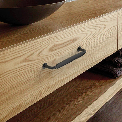 10 Pack 5 Inch Matte Black Kitchen Cabinet Handles And Drawer Pulls For Cupboards Cabinet Hardware shown on wooden drawer