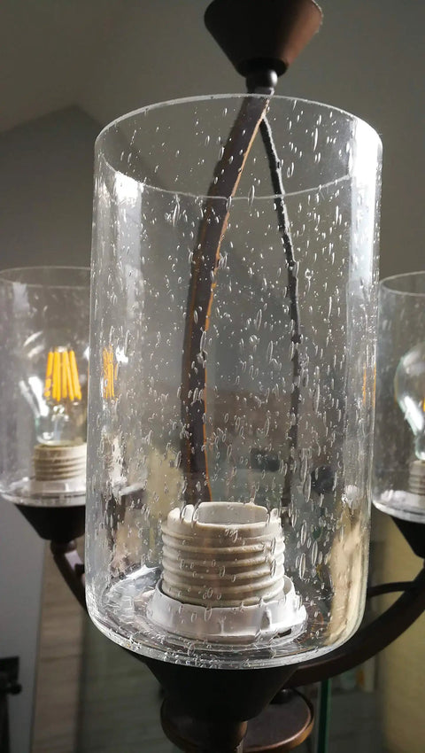 Seeded Bubble Glass Cylinder Shade For Light Fixtures 3 Pack Clear Replacement Fits 1 Inch By Five Eighths Fitter Modern Vintage Glow Keeps Your Ceiling Light Lit showing clear seeded glass with mounted bulb fitting