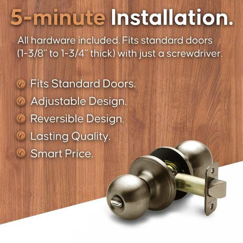 Ball Door Knob Privacy Function For Bedroom And Bathroom With Exterior Release Button Coin Or Screwdriver Release Antique Brass Finish 1 Pack ANSI Grade 3 Security No Key Needed shown against wood background