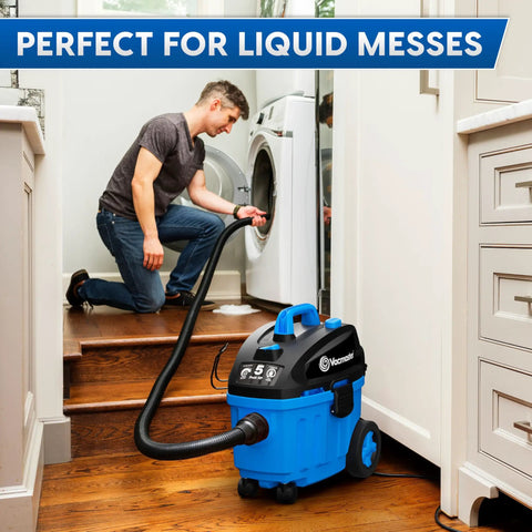 Man using 4 Gallon Wet Dry Vacuum With 5 Peak HP Two Stage Industrial Motor Workhorse Shop Vacuum For Home Garage