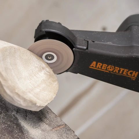 No Nonsense Heavy Hitter 8 Amp Mini Wood Carving Router with tungsten carbide blades shaping wood.