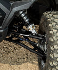 1.5 Inch Forward Offset A Arms For Polaris RZR XP 1000 And XP 4 1000 Fits Up To 33 Inch Tires 1.25 Inch Tubing 25 Percent Bigger Than Stock Black Finish Includes Standard Duty Ball Joints Off Road Ready Upgrade installed on front suspension with mud tire