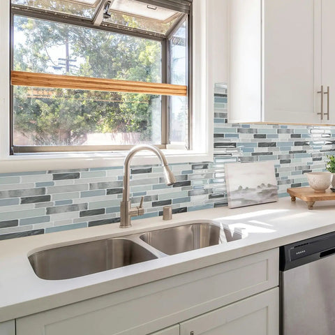 10 Sheet Peel And Stick Tile Backsplash Kit In Vinyl 3D Marble Look installed in kitchen above sink with window view