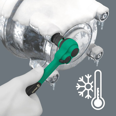 Zyklop Comfort Ratchet Set 3/8 Inch Drive, 16-Piece Metric Kit With Reversing Lever used in cold conditions on frosted machinery.