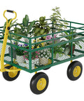Heavy Duty Steel Garden Cart Wagon With 1400 Lb Capacity loaded with potted plants, featuring 13 inch all terrain tires