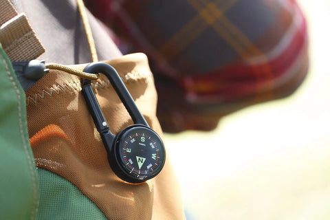 Liquid Filled Carabiner Compass For Hiking And Camping Lightweight And Compact Navigation Tool With Built In Carabiner on backpack