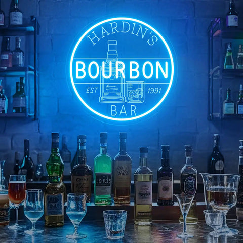 Personalized Bourbon Bar Neon Sign LED Wall Decor in home bar setup with liquor bottles on countertop and dim ambiance