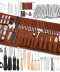 Front view of leatherworking tool set in brown roll case with punches, stamps, awls, and carving tools