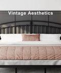 Classic King Size Metal Bed Frame With Sculpted Headboard And Vintage Romance Vibes Built Rock Solid On Thick Black Steel With Thirteen Hardened Slats For A Dead Silent Rest Plus Twelve Inch Underbed Storage For Super Easy Room Setup, featuring a black sculpted headboard and stylish bedding.