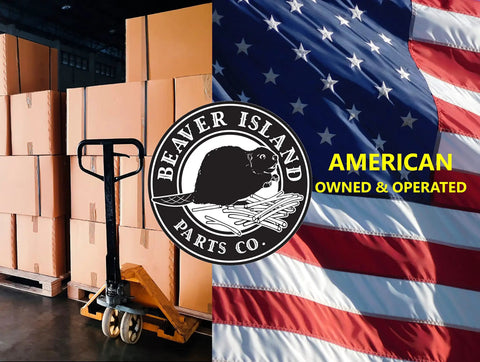 Warehouse with Beaver Island Parts Co. logo, pallet jack, boxes, and American flag background.