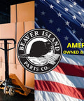 Warehouse with stacked boxes, hand pallet truck, Beaver Island Parts Co. logo, American flag, text 'American Owned & Operated'