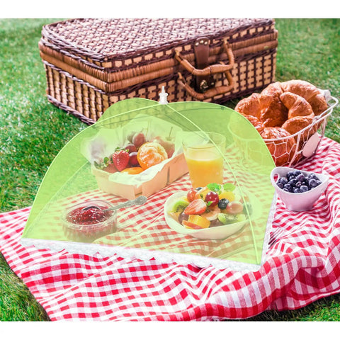 5 Pack Mesh Food Cover Tents For Picnics And Barbecues covering fruit and juice on a picnic blanket