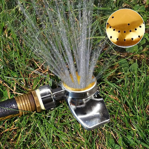 360 Degree Metal Spot Sprinkler For Small Gardens And Lawns in use, spraying water on grass, showing its gentle water flow