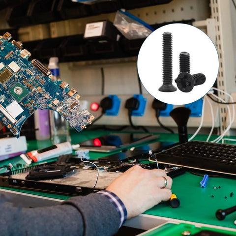 Laptop Screw Kit 450 Pcs M2 M2.5 M3 Countersunk Flat Head Phillips in use for laptop repair, circuit board shown