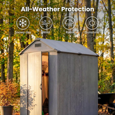 4x6 Foot Plastic Outdoor Storage Shed With Floor Lockable Door Vents UV Resistant Resin Durable Backyard Garden Shed For Lawn Mower And Gear Dark Grey in a sunny outdoor setting showing its all-weather protection features.