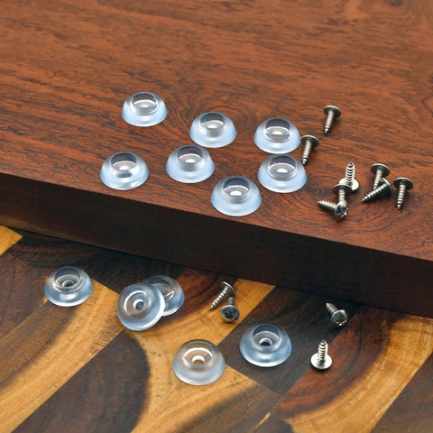 Clear Rubber Feet For Cutting Boards Lock Down Tight Non Slip Bumpers With Stainless Screws on wooden surface.