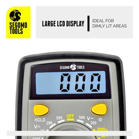 Close-up of Segomo Tools 500 Volt Digital Multimeter With Backlit LCD Display showing LCD screen for AC and DC testing in dim light.