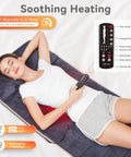 Woman using Full Body Massage Mat With Heat And 10 Vibrating Motors Memory Foam Pad for Back Pain Relief, remote in hand