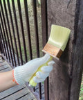 Person using 3 Inch Deck Stain Brush 2 Pack For Staining Wood Walls And Fences With Premium Polyester Bristles Thick Bristles For Rough Surfaces