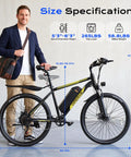 Man standing beside Beast 750W Peak Electric Mountain Bike With 48V Battery And 22 MPH Top Speed, 26 Inch Black And Yellow, size specs.