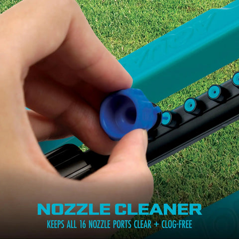 Hand cleaning nozzle on Oscillating Sprinkler With Adjustable Spray And 16 Clog Resistant Nozzles Metal Base For Up To 3600 Sq Ft Coverage