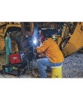 Welder wearing KH807XL Brown Flame Resistant Heavy Duty Leather Welding Jacket working under machinery