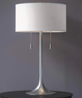 Stowe Table Lamp in Brushed Steel Finish With White Textured Drum Shade, Modern Vibe, 30 Inch Tall, 17 Inch Shade Diameter on table