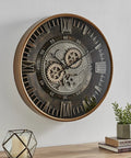Killer Twenty Four Inch Oversized Wall Clock Featuring Real Moving Gears Heavily Distressed Antique Gold Dial Bold Roman Numerals on the wall.