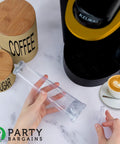 Person holding filter from Water Filter Starter Kit For Keurig 2.0 Coffee Brewers, Includes 6 Charcoal Filters And Filter Holder