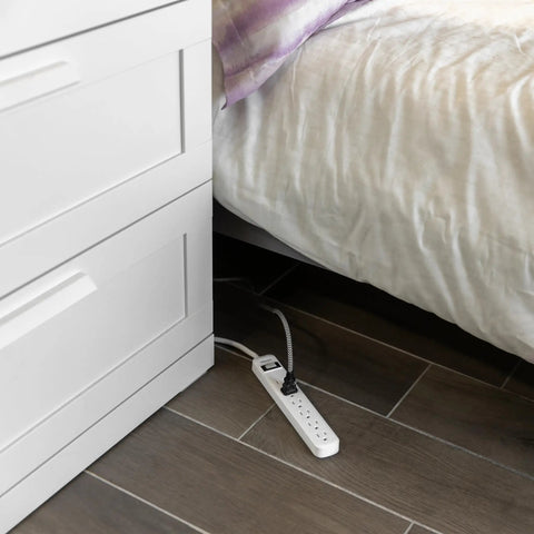 Six Outlet Surge Protector Power Strip With A 2 Ft Cord, 450 Joules Surge Protection, Wall Mount Design, under bed in home office