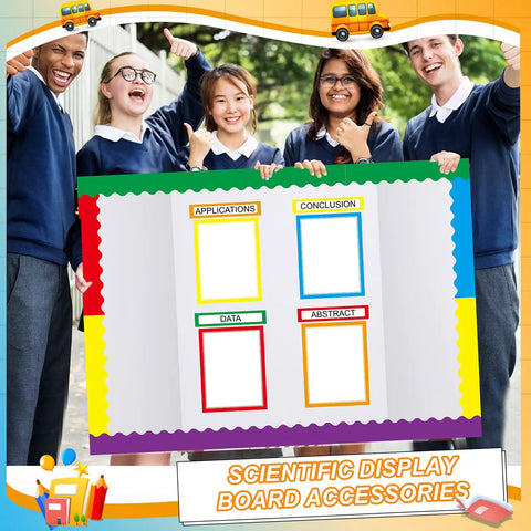 Students holding a Rainbow Science Fair Board Kit with 60 scalloped borders, showcasing colorful bulletin board trim.