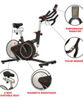 Smooth Riding Indoor Cycling Bike Featuring Forty Pound Rear Flywheel And Digital Console To Dominate Your Daily Grind And Ride With Silent Magnetic Resistance, side view with adjustable seat and performance monitor.